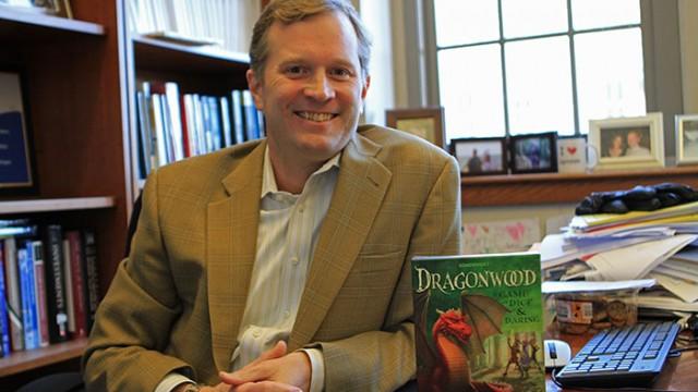 Professor Kisgen promotes his new board game Dragonwood