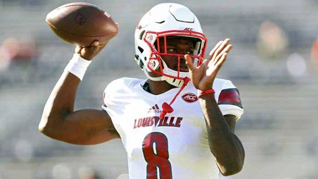 FILE - In a Saturday, Oct. 29, 2016 file photo, Louisville quarterback Lamar Jackson (8) throws a pass during warmups before an NCAA college football game against Virginia in Charlottesville, Va. Jackson has become one of college football’s most recognizable players the first two months of the season. He enters November as a prohibitive favorite to become Louisville’s first Heisman winner. (AP Photo/Ryan M. Kelly, File)