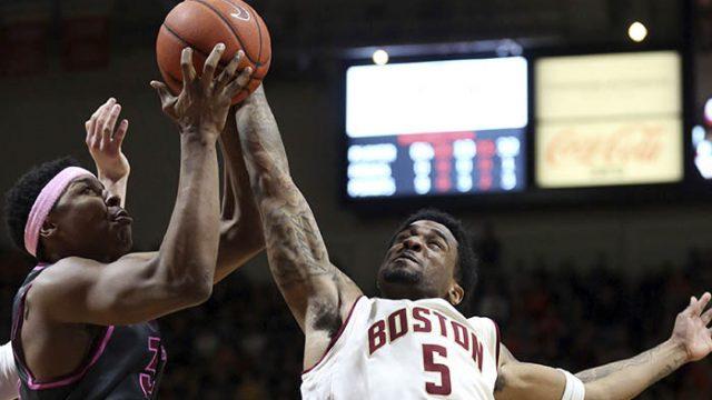 Virginia Tech's Zach LeDay (32) battles for a defensive rebound against Boston College's Garland Owens (5)  in the first half of an NCAA college basketball game in Blacksburg, Va., Sunday Jan. 29 2017. (Matt Gentry/The Roanoke Times via AP)