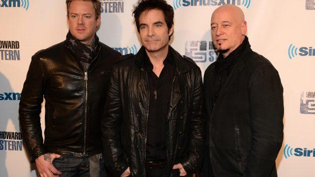 NEW YORK, NY - JANUARY 31:  (L-R) Musicians Scott Underwood, Pat Monahan and Jimmy Stafford of the band Train attend "Howard Stern's Birthday Bash" presented by SiriusXM, produced by Howard Stern Productions at Hammerstein Ballroom on January 31, 2014 in New York City.  (Photo by Theo Wargo/Getty Images for SiriusXM)