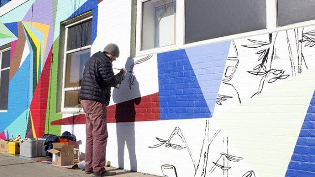 "Evo" Mural Creates Vibrant Visual Masterpiece on Western Ave.