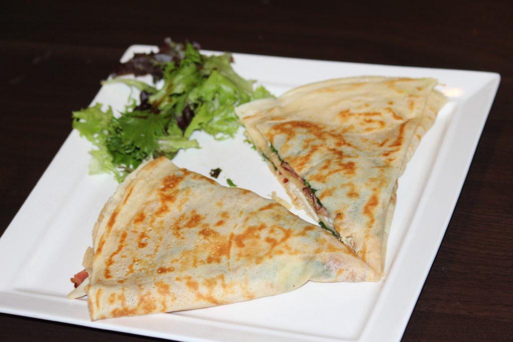 The Heroes at Paris Creperie Don't Wear Crepes, They Make Them