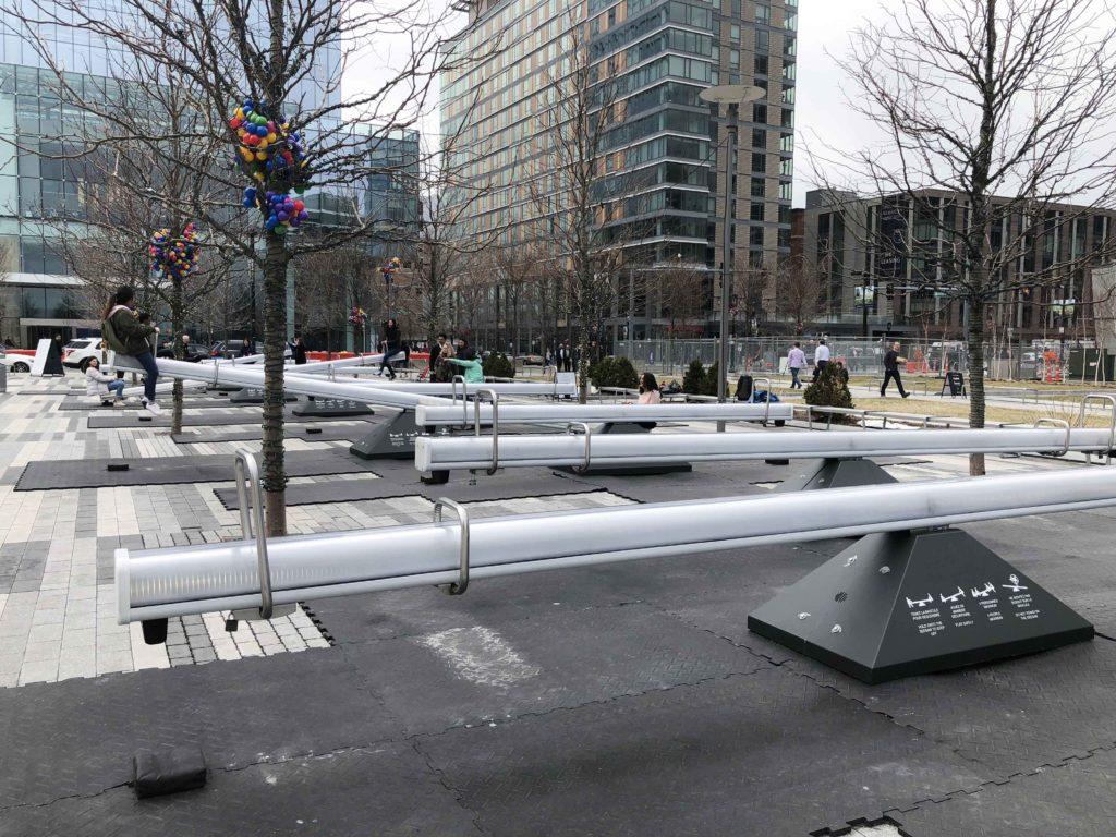 Giving in to Childhood Nostalgia at Seaport Common Seesaws