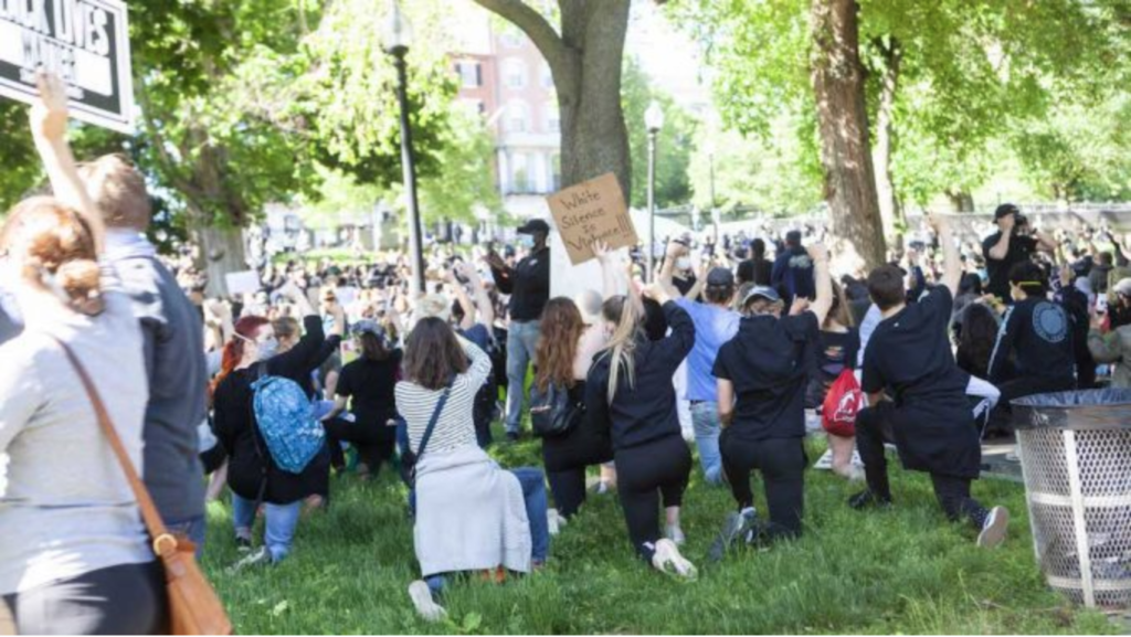 Protesters gather in Boston Common on Sunday. (Colleen Martin / Heights Editor)