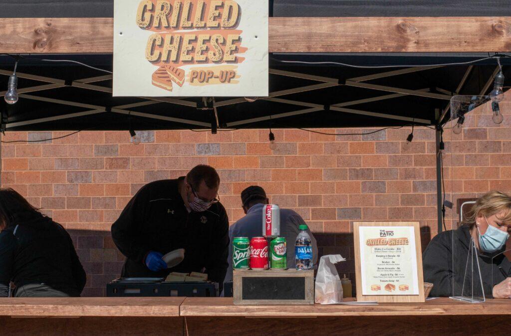 The front of the grilled cheese pop event at "The Patio at Walsh."