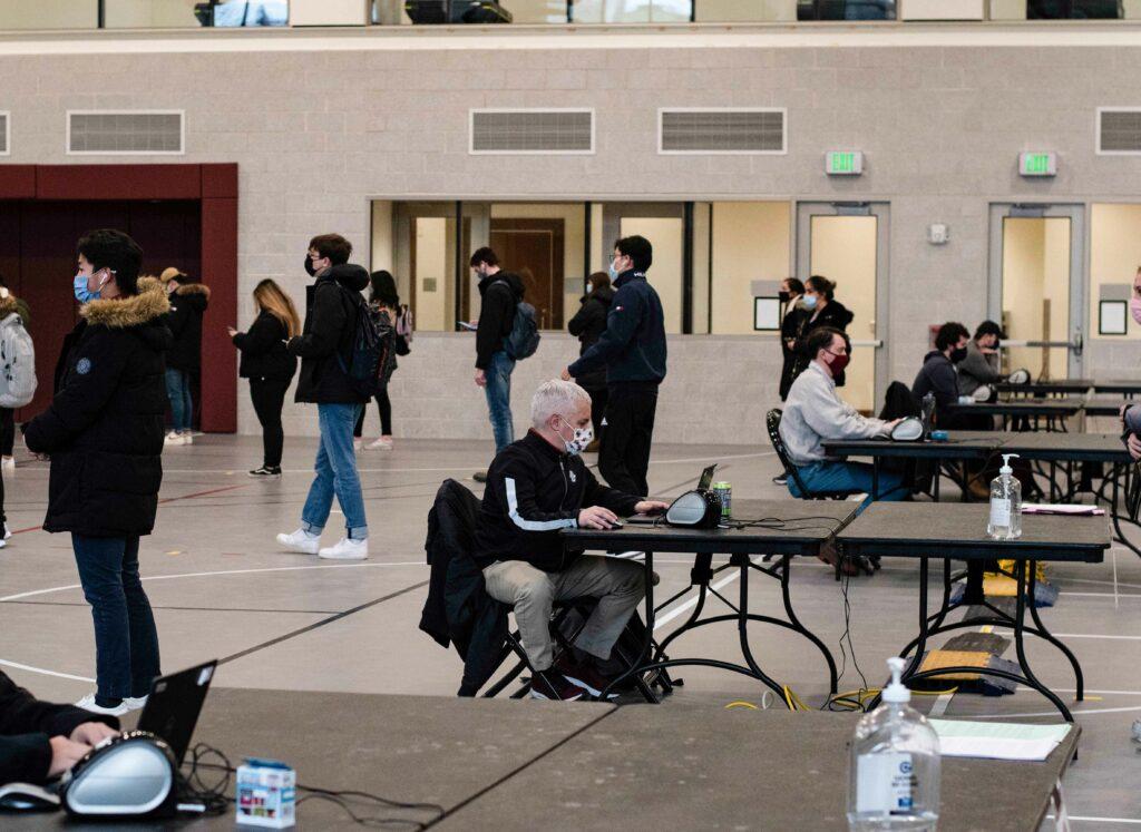 “Checking in people and printing their label … it's completely out of like the realm of my job responsibilities, but I think in a unique situation like COVID, everybody kind of has to roll up their sleeves and, and do whatever job needs to be done to make sure that we're all here, safe, and can be at Boston College together,” Morris said. 