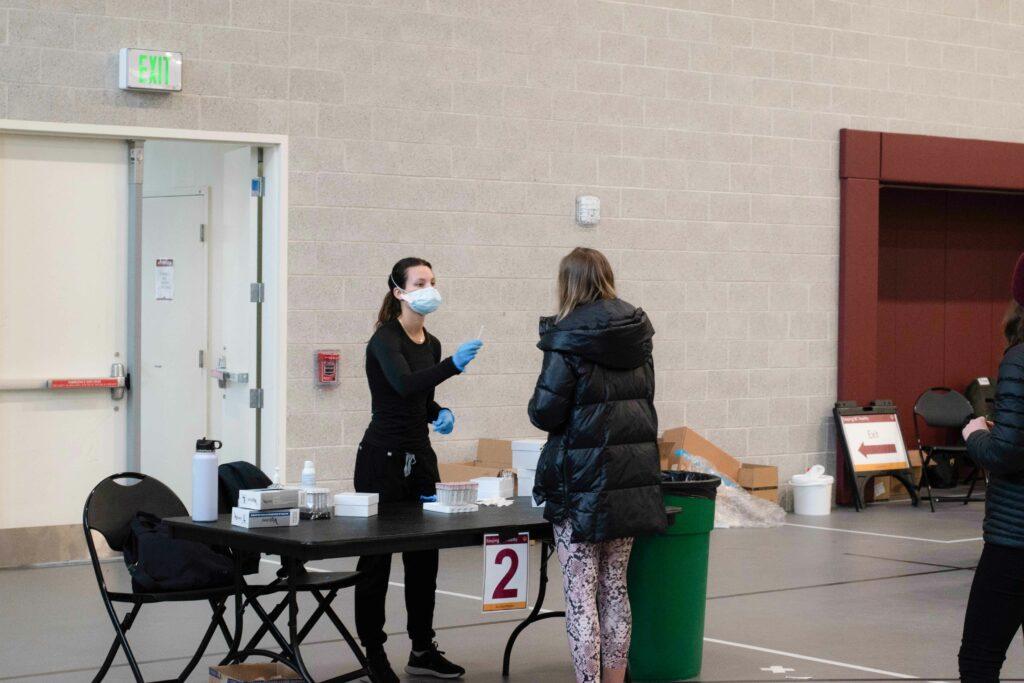 “Checking in people and printing their label … it's completely out of like the realm of my job responsibilities, but I think in a unique situation like COVID, everybody kind of has to roll up their sleeves and, and do whatever job needs to be done to make sure that we're all here, safe, and can be at Boston College together,” Morris said. 