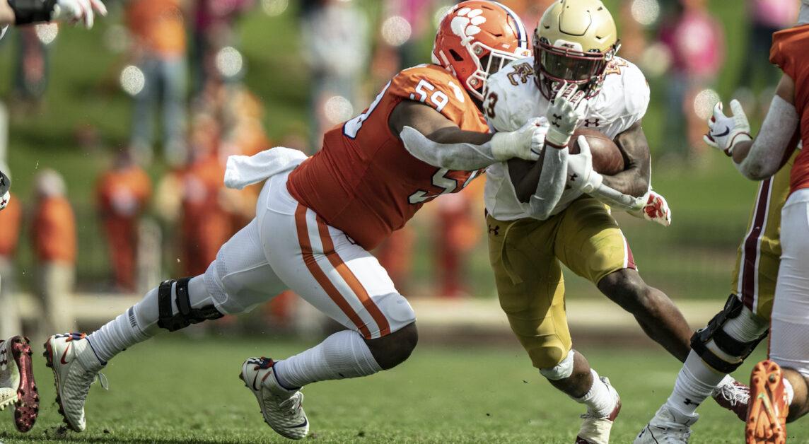 Clemson defensive tackle Jordan Williams(59) tackles Boston College running back Travis Levy(23) during the second quarter of the game against Boston College, Oct 31, 2020; Clemson, South Carolina, USA;  at Memorial Stadium. Mandatory Credit: Josh Morgan - USA TODAY Sports
