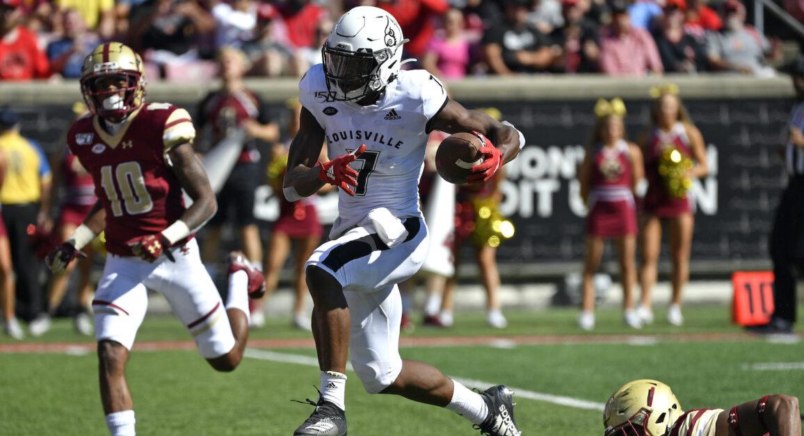 Louisville wide receiver Dez Fitzpatrick (7) runs from the Boston College defense as he heads for for the end zone during the second half of an NCAA college football game in Louisville, Ky., Saturday, Oct. 5, 2019. Louisville won 41-39. (AP Photo/Timothy D. Easley)