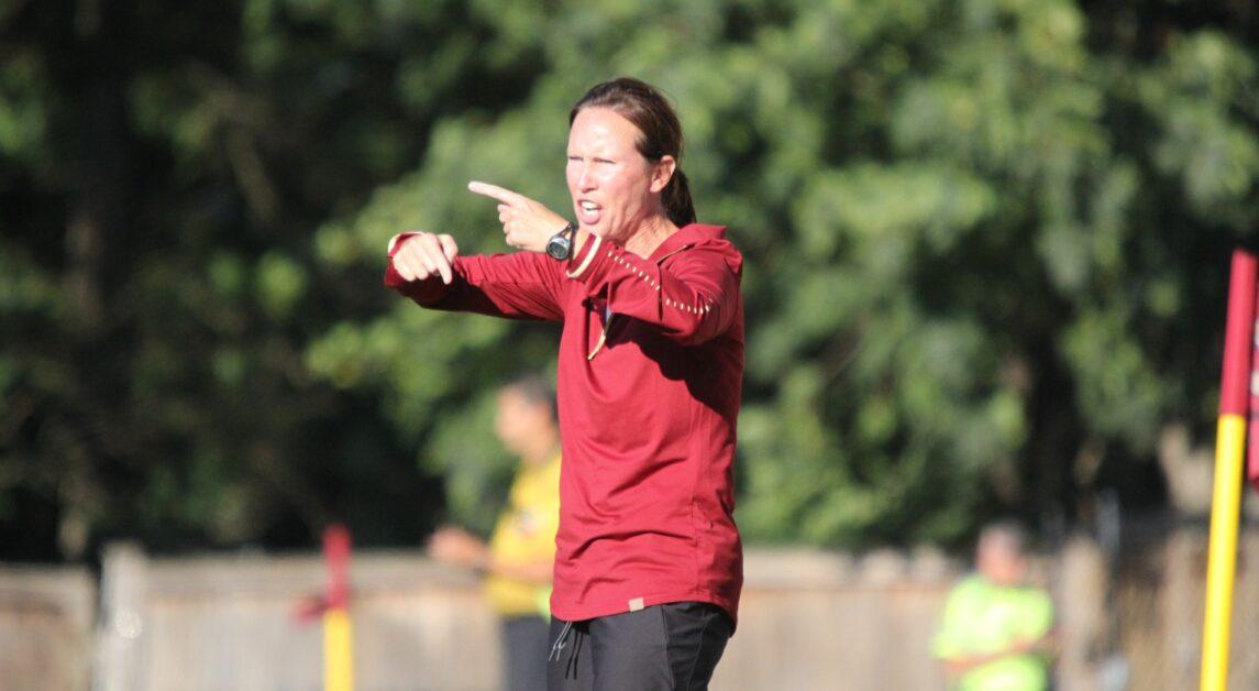 Foley coaching a women's soccer game while still at Boston College.