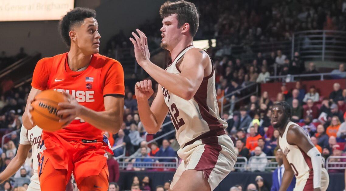 While Quinten Post (right) led BC with 18 points, Jesse Edwards (left) led Syracuse with 27 points in the Orange’s victory. (Kellen Davis / For the Heights)