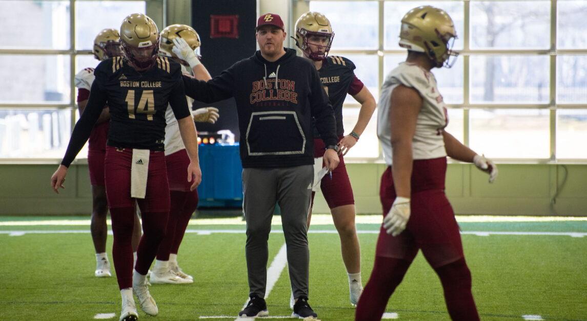 Quarterback Emmett Morehead (left) and offensive coordinator Steve Shimko (right) at BC’s spring practice. (Nicole Vagra / Heights Editor)