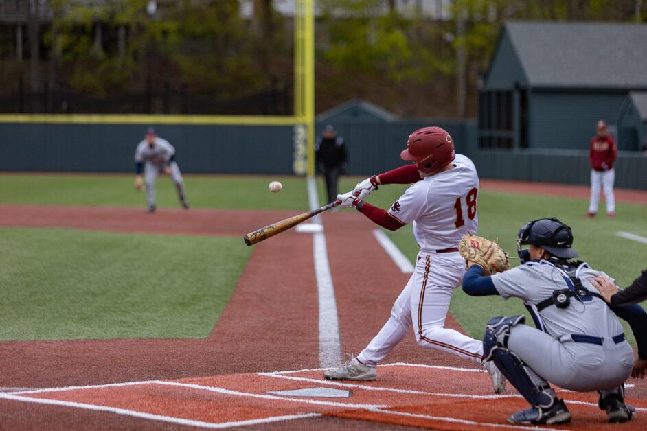 Boston College baseball catcher Peter Burns swung at a pitch on Wednesday, April 19, 2023, in the Eagles' loss against Connecticut (Kenneth Chen / Heights Staff). 