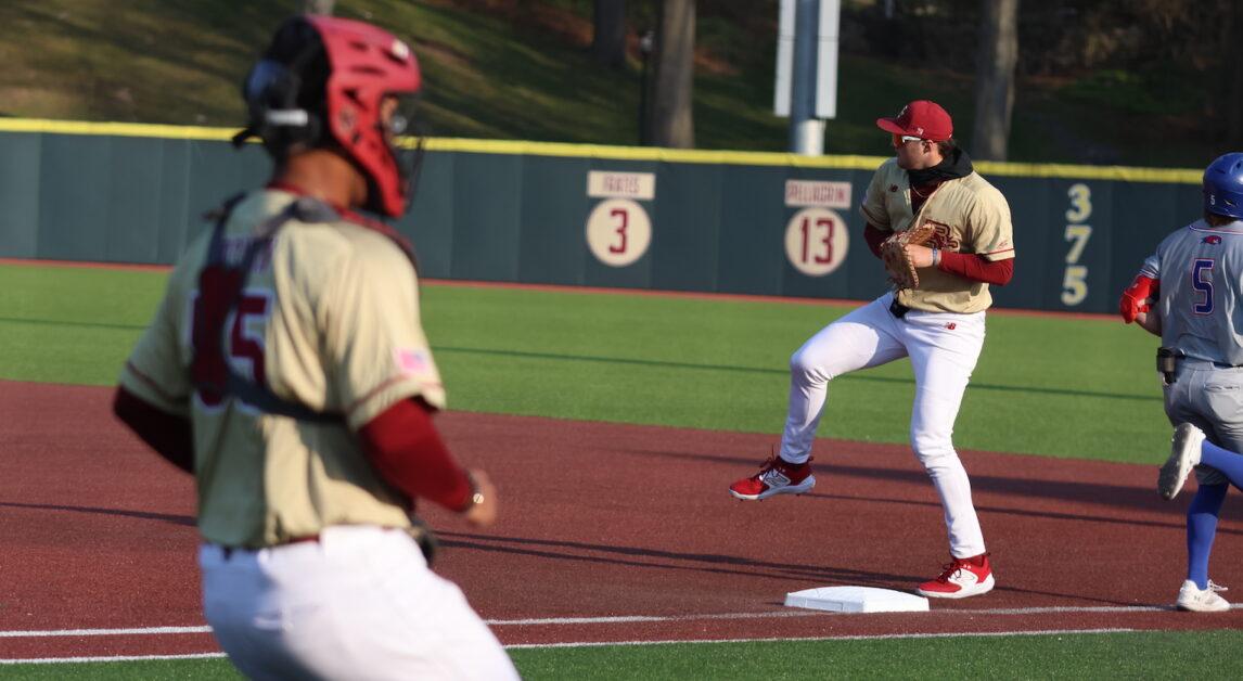 Joe Vetrano (right) popped two crucial home runs in the contest, and relief pitcher Eric Schroeder pitched 4.1 innings of one-run baseball. (Kellen Moore / Heights Staff)
