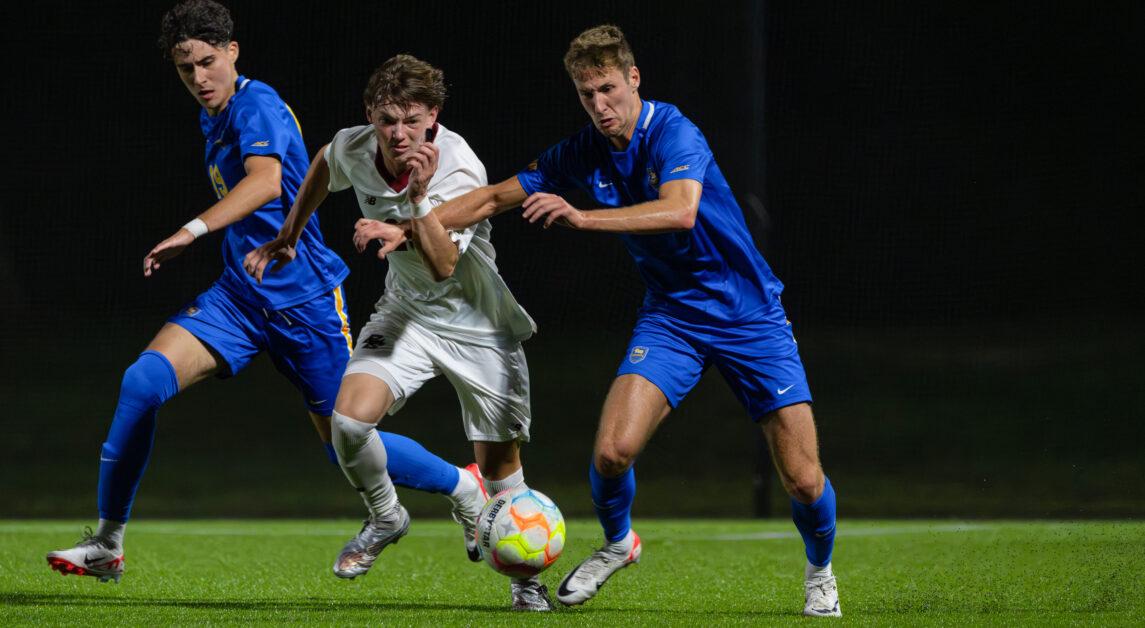 BC midfielder Jack Burkhardt fights his way to the ball in the Eagles’ 0-0 draw against the Pitt Panthers on Friday, September 15, 2023 (Paul Criado / For The Heights).