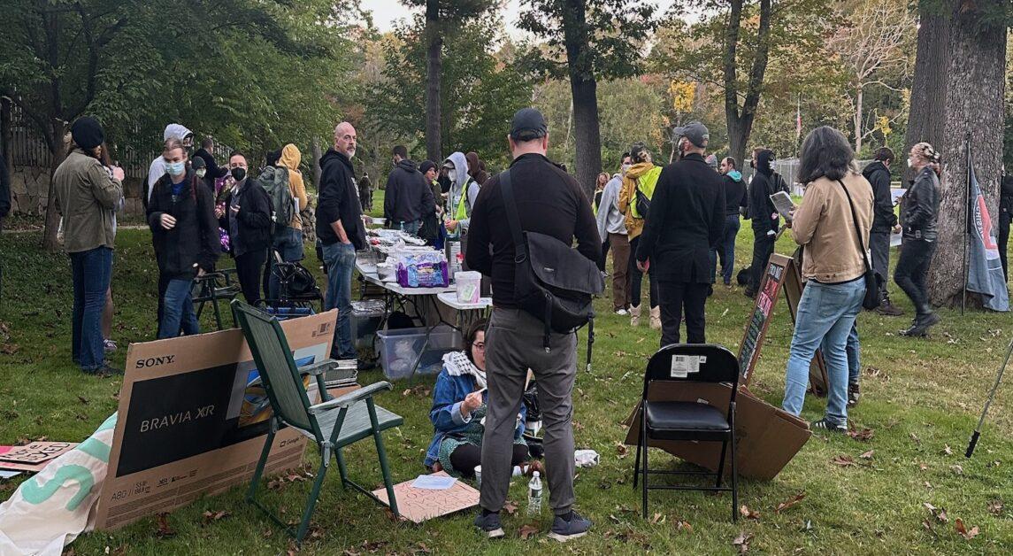 The protest took place at Lyons Park in Newton, where protestors said that the organization is bigoted and discriminatory. (Maria Stefanoudakis / For the Heights)