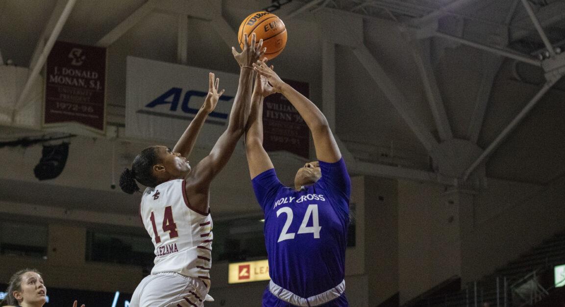 BC women’s basketball guard Kayla Lezama jumps for the ball against a Holy Cross defender in the Eagles’ home opener on Monday, November 6, 2023 (Sarah Fleming / Heights Staff). 