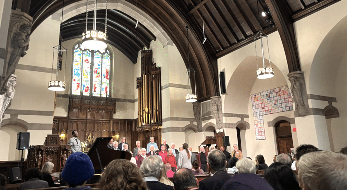 Choirs from First Unitarian Universalist Society and Myrtle Baptist Church performed Monday. (Genevieve Morrison / Heights Editor)