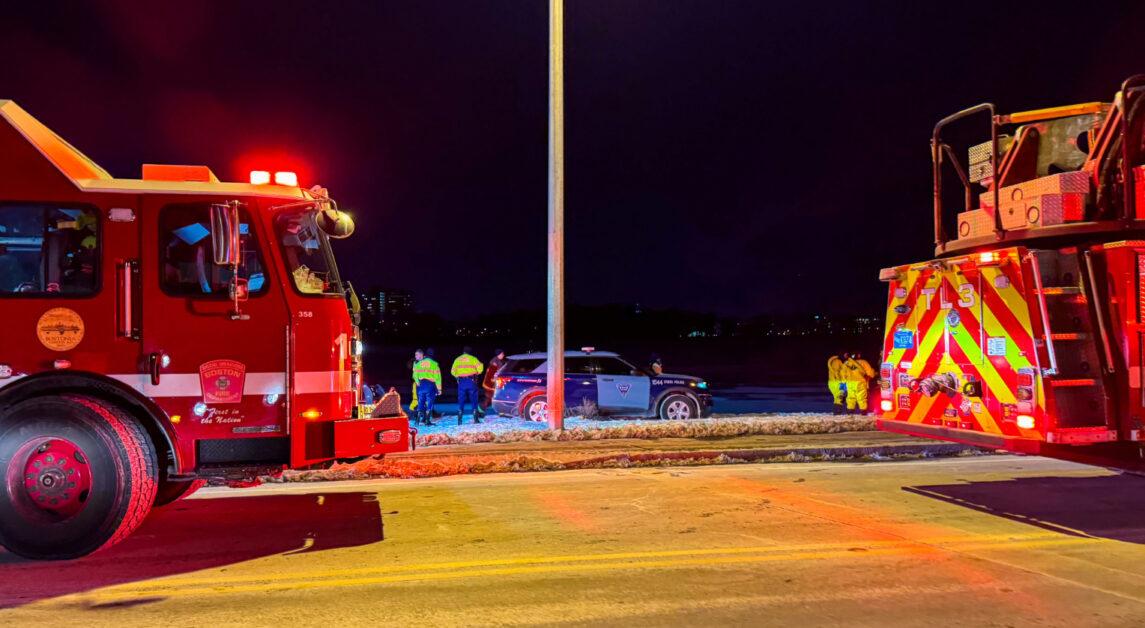 Dozens of police officers and firefighters responded Wednesday night to a report that a car had driven onto the ice at the Chestnut Hill Reservoir, but the incident was later determined to be a false alarm. 